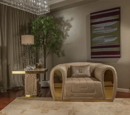 High-end Collier armchair featuring contemporary quilted suede fabric for ultimate Italian living room comfort.