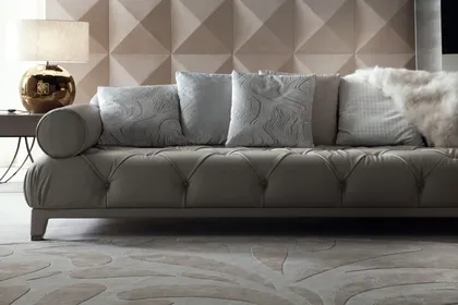 Contemporary fixed sofa with plush upholstery designed as a central statement piece for living rooms, Italian sofa